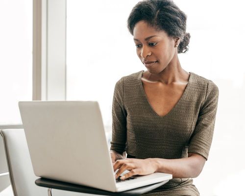 Woman on her laptop job searching