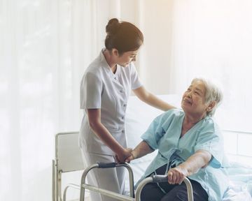 aged care worker with a patient